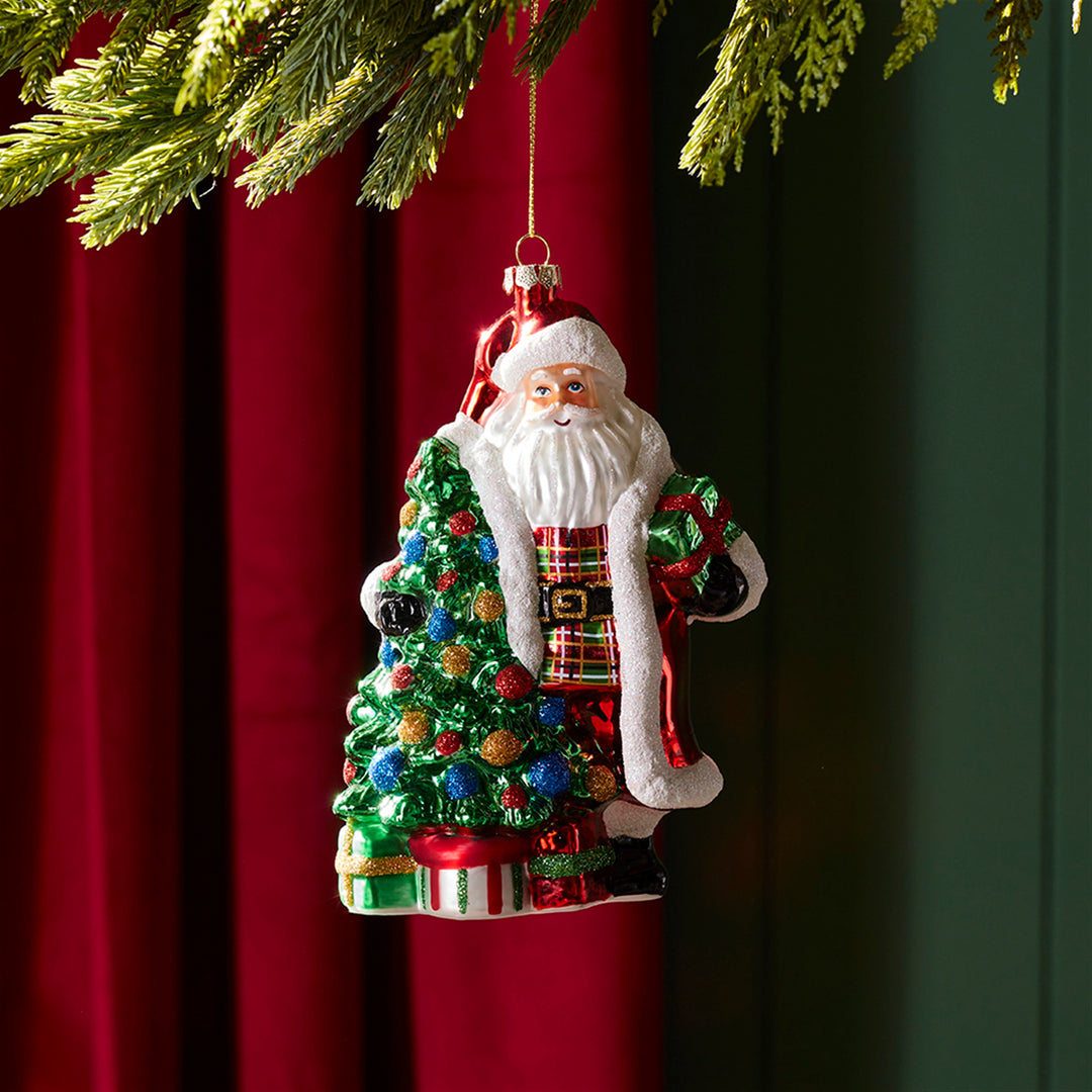 Santa's Christmas Traditions Glass Ornament
