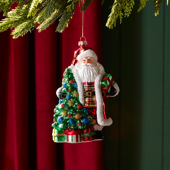 Santa's Christmas Traditions Glass Ornament