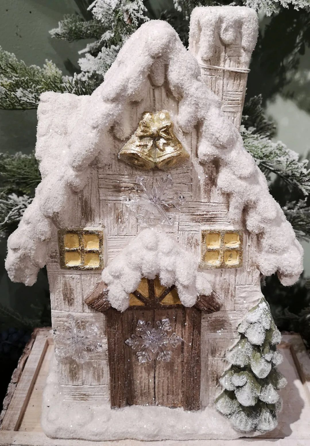 Illuminated Snow Bell Cottage