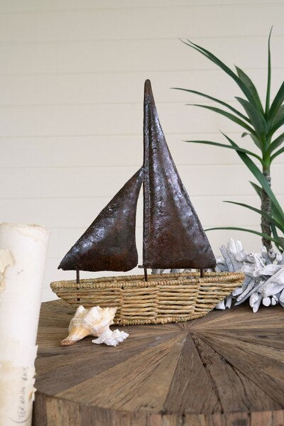 Seagrass Boat with Rustic Hand Hammered Sail