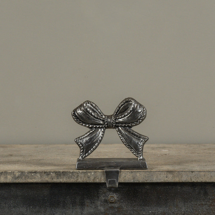 Antique Silver Bow Stocking Holder